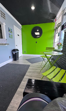 Bright green dining nook inside Rock Solid Grill