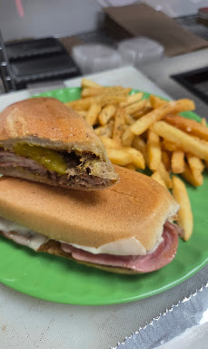 Pressed Cubano sandwich with fries